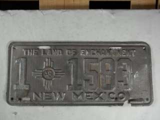 1949 Santa Fe New Mexico 1 1583 License Plate Zia. Has some surface 