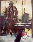 1971 vintage cigarette Ad Marlboro Man cowboy riding Horse