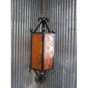   century 1960s mediterranean gothic black hanging swag amber paned lamp