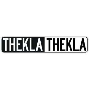   NEGATIVE THEKLA  STREET SIGN