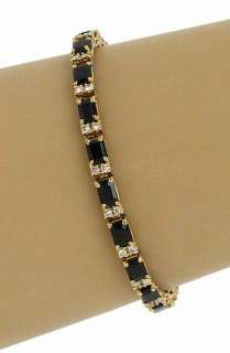   stunning 14k gold diamonds and sapphires tennis bracelet the piece