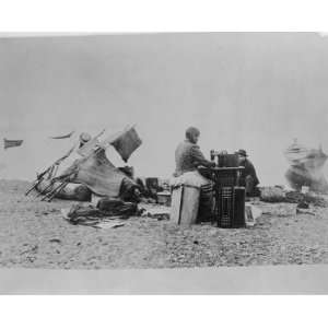   Walter P. Miller, Seattle, Wash. Photograph shows a Native woman sitt