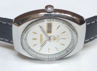   21 jewels day date automatic self winding japan made wrist watch