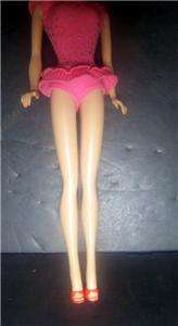 ears dark haired barbie has shoes one stand is included listing with a 