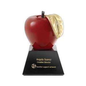  Red apple award on base. Electronics