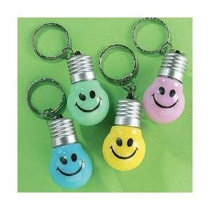    PLASTIC SMILE LIGHT UP KEY CHAIN (1 DOZEN)   BULK Toys & Games