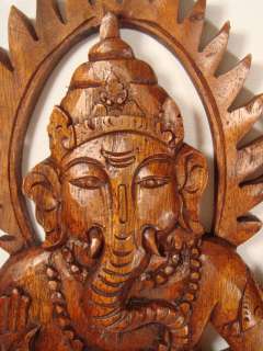 beautiful and cute wall carving. This wall panel depicts lord Ganesh 