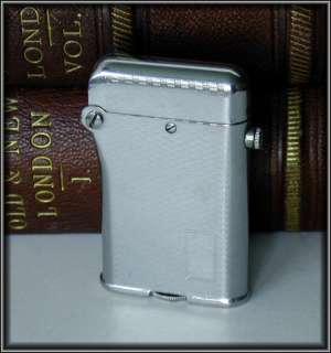   lighter with safety lock screw down lid & firing activation button