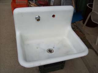 Antique Cast Iron Porcelain coated sink w/ back splash  