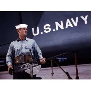 Sailor Holds a .30 Caliber Machine Gun at the Naval Air Base, Corpus 