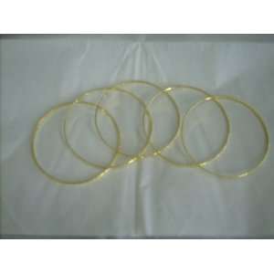  FIVE NEW GOLD PLATED BANGLES 