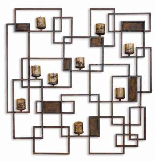 This wall mount geometric candle holder is made from hand forged metal 