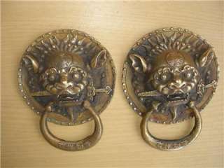chinese round foo dogs head & sword door knockers  
