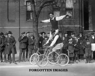 BICYCLE STREET PERFORMER DOING TRICKS 1920s PHOTOGRAPH  