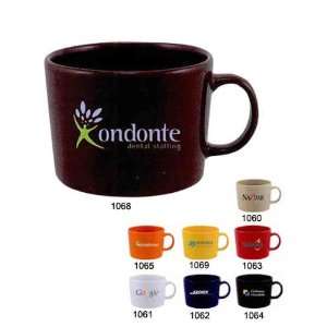     Short glossy ceramic mug with C handle, white.